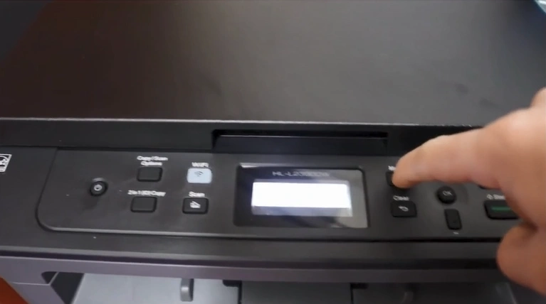 How to Connect a Brother Printer to Wi-Fi Without Using a Cable 1 Access the printer’s display panel and select the Menu option.